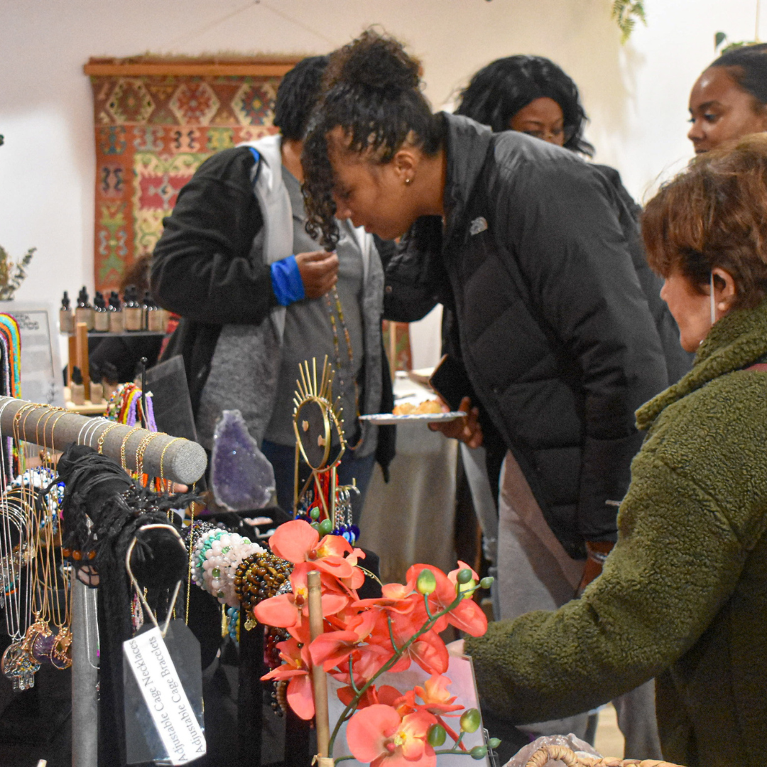 Community members browsing products at the Self Care Fair