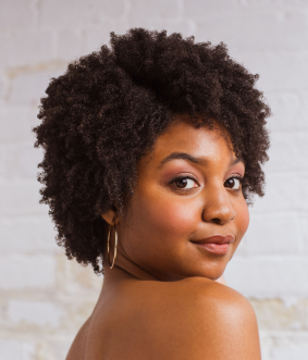 A woman with very tightly-textured hair