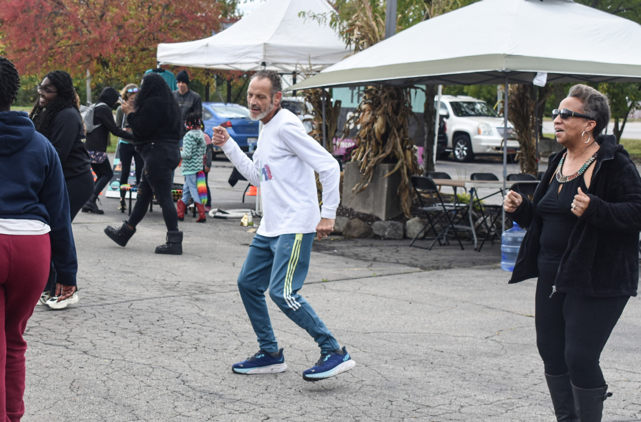 People dancing to music at the Self Care Fair